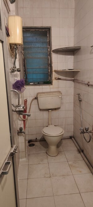 Bathroom in 2 BHK Apartment at The Kamal Sagar CHS, Bhandup East – for Rent
