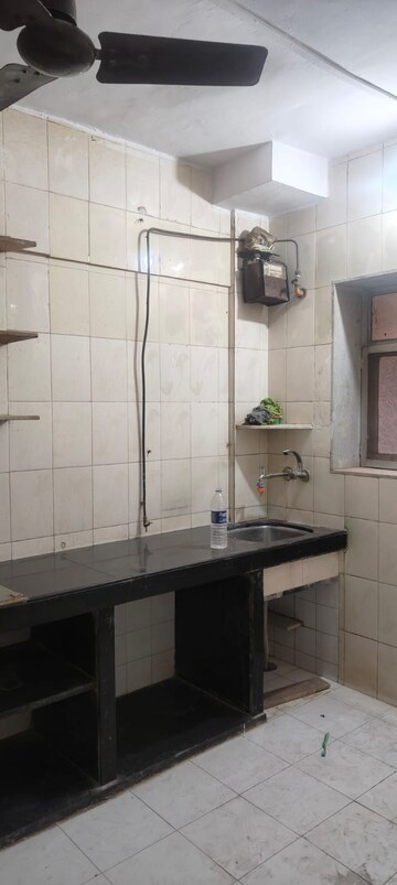 Kitchen in 2 BHK Apartment at The Kamal Sagar CHS, Bhandup East – for Rent