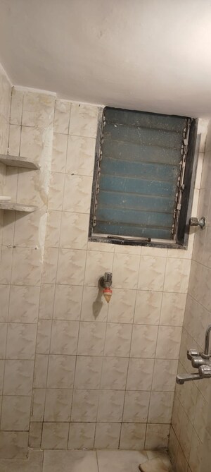 Bathroom in 2 BHK Apartment at The Kamal Sagar CHS, Bhandup East – for Rent