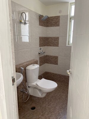Bathroom in 3.5 BHK Apartment at Shree Vardhman Flora, Sector 90 – for Rent
