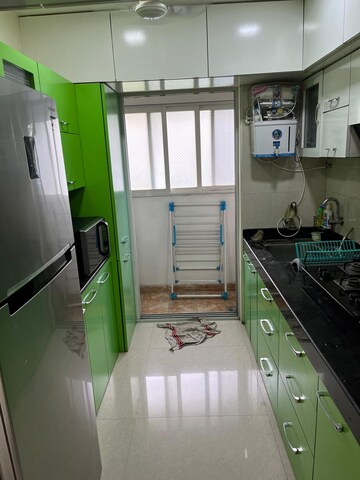 Kitchen in 1 BHK Apartment at Cosmos 27 Gbr, Kasarvadavali – for Rent