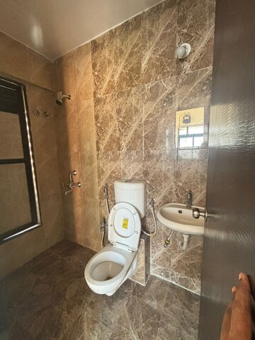 Bathroom in 1 RK Apartment at Haware Dahlia, Kasarvadavali – for Sale