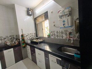 Kitchen in 1 BHK Apartment at Swastik Residency 1, Ghodbunder Road – for Sale