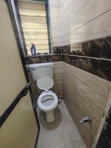 Bathroom in 1 BHK Apartment at Kendriya Vihar Seawoods, Seawoods West – for Rent