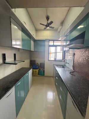 Kitchen in 1 BHK Apartment at Puranik Hometown, Ghodbunder Road – for Sale