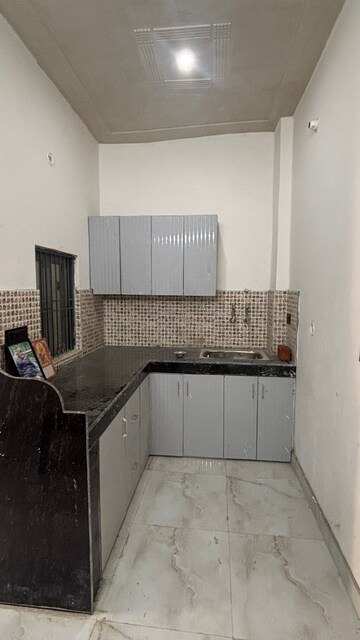 Kitchen in 4 BHK Apartment at ATS Rhapsody, Sector 1 Greater Noida – for Rent