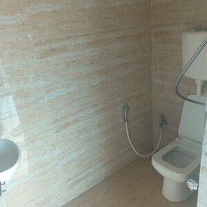 Bathroom in 1 BHK Apartment at Shellproof Gladiolus Tower, Vasai East – for Rent