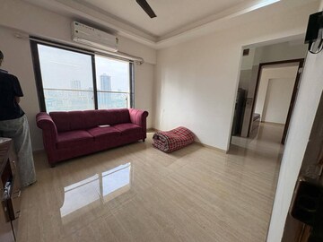 Living Room in 1 BHK Apartment at Je and Vee Vrindavan, Malad East – for Rent