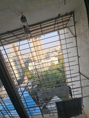 Staircase in 2 BHK Apartment at Vora Skyline Acropolis, Borivali West – for Sale