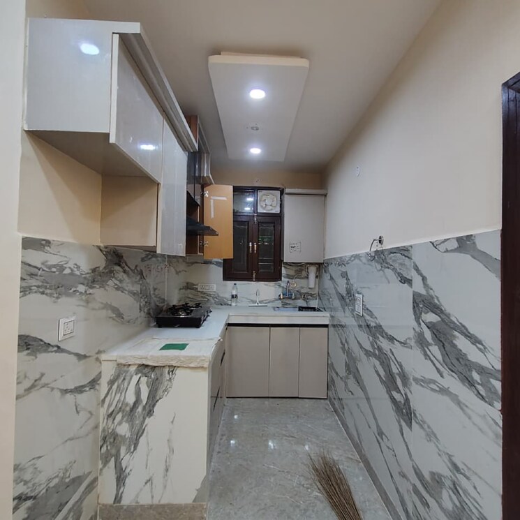 Kitchen, uttam nagar west 3 Bedroom 90 Sq.Yd. Builder Floor In Uttam Nagar West Delhi 9582027