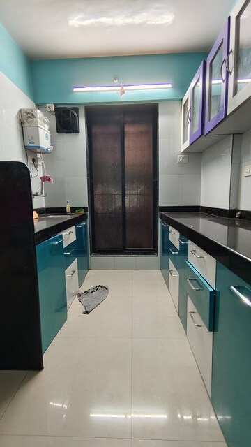 Kitchen in 2 BHK Apartment at Om Sai Agrima Apartment , Mulund East – for Rent
