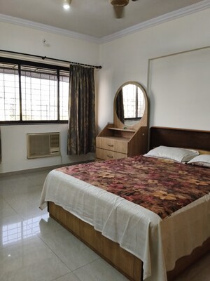 Bedroom in 3 BHK Apartment at Silver Nook CHS, Santacruz East – for Rent