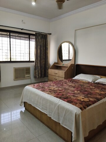 Bedroom in 3 BHK Apartment at Silver Nook CHS, Santacruz East – for Rent