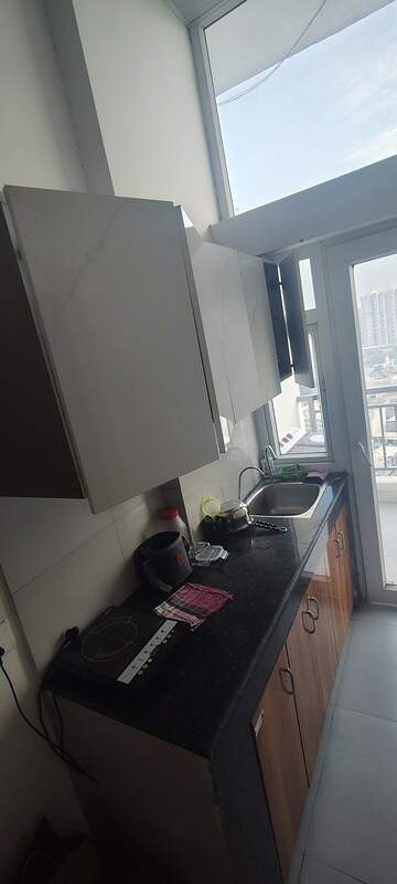 Kitchen in 1 BHK Apartment at DAH Greentech NX One, Tech Zone 4 Greater Noida – for Rent