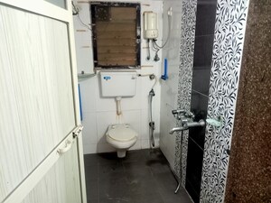 Bathroom in 2 BHK Apartment at Swarna Apartments, Mira Road – for Rent