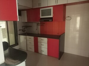 Kitchen in 2 BHK Apartment at Swarna Apartments, Mira Road – for Rent