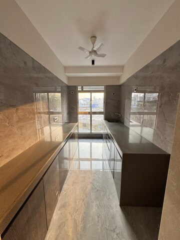 Kitchen in 2 BHK Apartment at 127 Raj Homes, Penkarpada – for Sale