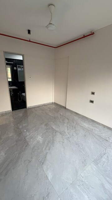 Master Bedroom in 1 BHK Apartment at 127 Raj Homes, Penkarpada – for Sale