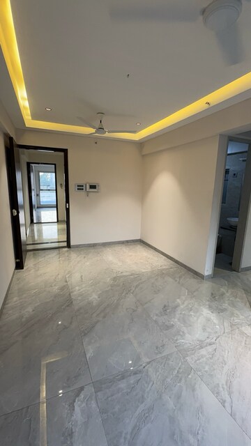 Living Room in 1 BHK Apartment at 127 Raj Homes, Penkarpada – for Sale