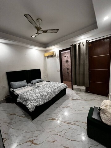 Bedroom in 3 BHK Builder Floor at Freedom Fighters Enclave – for Rent