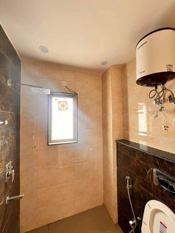 Bathroom in 2 BHK Builder Floor at Freedom Fighters Enclave – for Rent