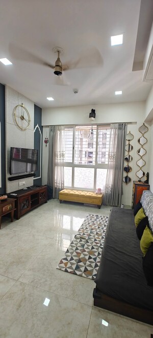 Living Room in 2 BHK Apartment at Lodha Amara, Kolshet Road – for Rent