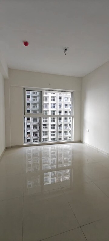 Bedroom in 2 BHK Apartment at Lodha Amara, Kolshet Road – for Rent