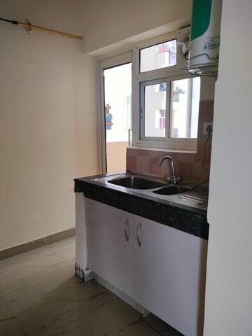 Kitchen in 3 BHK Apartment at Nimbus The Hyde park, Sector 78 – for Sale