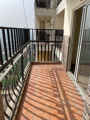 Balcony in 4 BHK Apartment at Amrapali Crystal Homes, Sector 76 – for Rent
