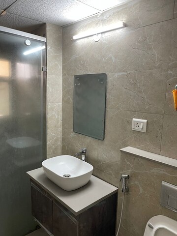 Bathroom in 4 BHK Apartment at Amrapali Crystal Homes, Sector 76 – for Rent