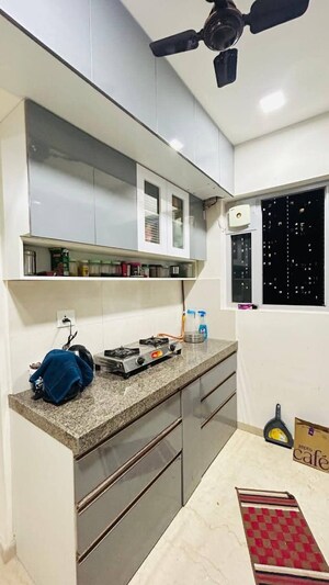 Kitchen in 2 BHK Apartment at Piramal Vaikunth, Balkum Pada – for Rent