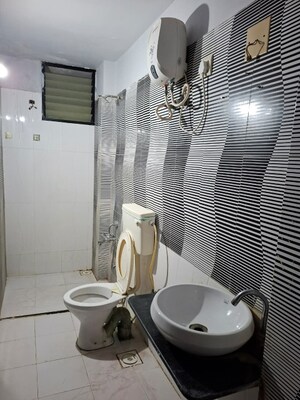 Bathroom in 3 BHK Apartment at Shree Balaji Agora Residency, Sughad – for Rent