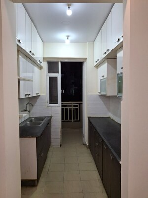 Kitchen in 3 BHK Apartment at Amrapali Platinum, Sector 119 – for Sale