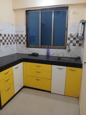 Kitchen in 1 BHK Apartment at Matru Aashish, Parel – for Rent