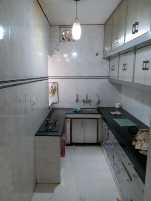 Kitchen in 3 BHK Builder Floor at Kalkaji – for Sale