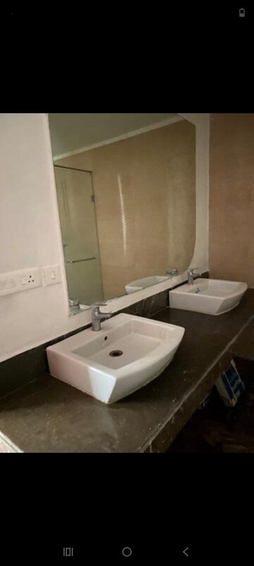 Bathroom in 4 BHK Apartment at Mahagun Mezzaria, Sector 78 – for Rent