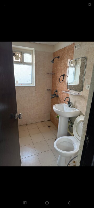 Bathroom in 3 BHK Apartment at Antriksh Golf View, Sector 78 – for Rent