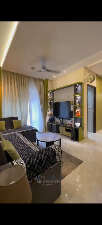 Living Room in 2 BHK Apartment at Lodha Amara, Kolshet Road – for Rent