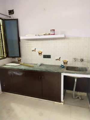 Kitchen in 1.5 BHK Builder Floor at RWA Apartments Sector 12, Sector 12 – for Rent