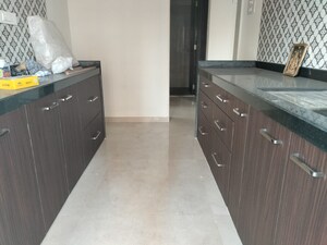 Kitchen in 3 BHK Apartment at Cosmos Jewels Ruby, Ghodbunder Road – for Rent