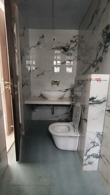 Bathroom in 4 BHK Apartment at Pride Paradise Society, Model Colony – for Sale