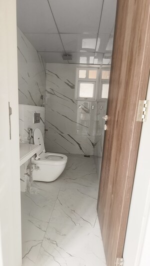 Bathroom in 4 BHK Apartment at Pride Paradise Society, Model Colony – for Sale