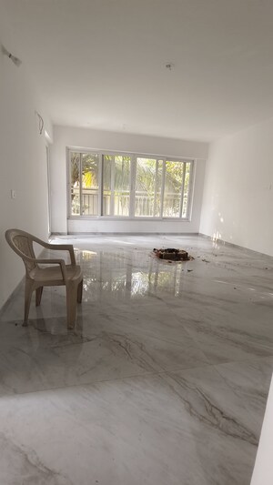 Room in 4 BHK Apartment at Pride Paradise Society, Model Colony – for Sale