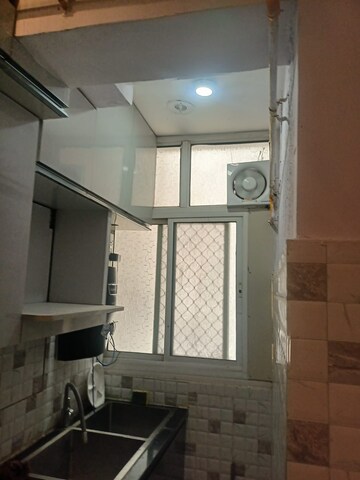 Kitchen in 2.5 BHK Apartment at Ratan Pearls, Sector 16 Greater Noida – for Rent
