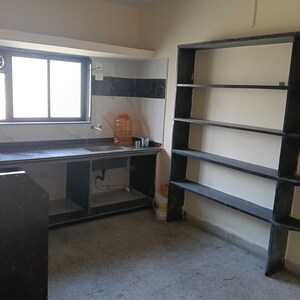 Kitchen in 2 BHK Apartment at Sun City, Sinhagad Road – for Rent