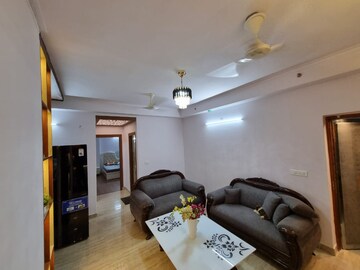 Living Room in 2 BHK Apartment at Amrapali Golf Homes, Sector 4 Greater Noida – for Rent