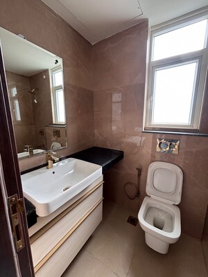 Bathroom in 3 BHK Apartment at Emaar Gurgaon Greens, Sector 102 – for Sale
