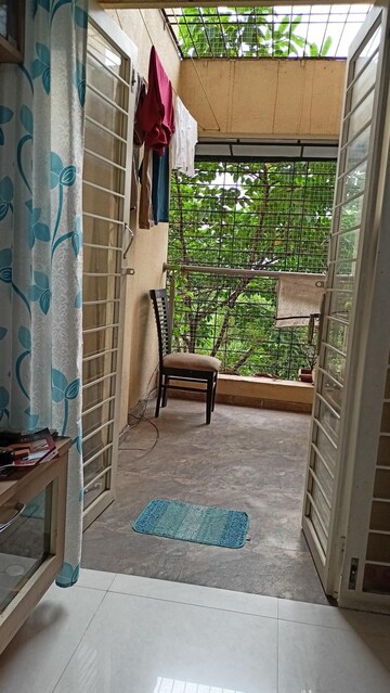 Terrace in 2 BHK Apartment at Gananjay Society, Kothrud – for Rent