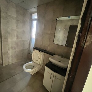 Bathroom in 2.5 BHK Apartment at Mahagun Mirabella Highrise, Sector 79 – for Rent