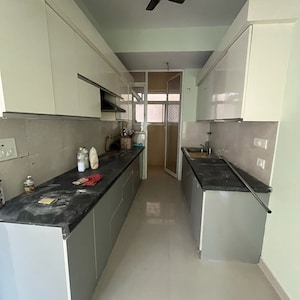 Kitchen in 2.5 BHK Apartment at Mahagun Mirabella Highrise, Sector 79 – for Rent